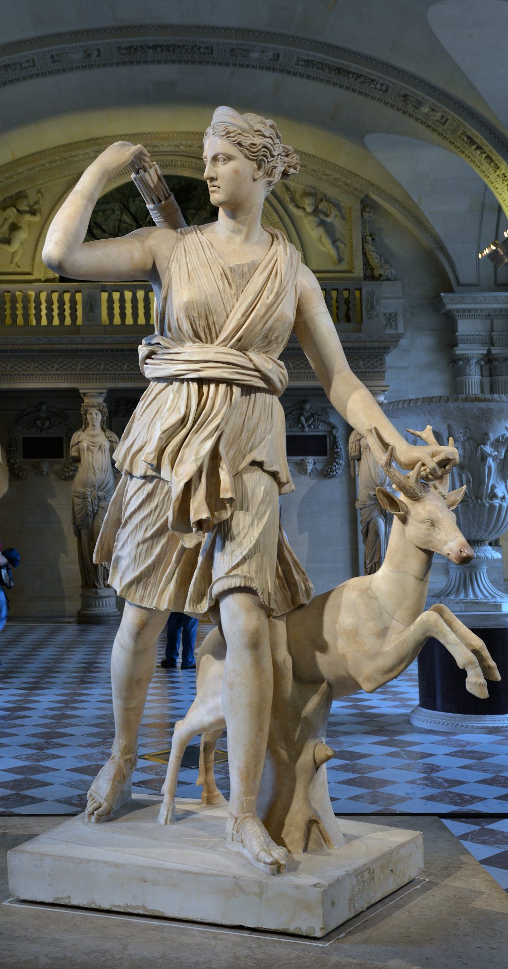 A marble statue of Artemis hunting a deer