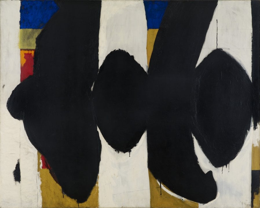 Abstract black and white painting with colorful highlights in the background by Robert Motherwell titled “Elegy to the Spanish Republic XXXIV”, featuring bulbous, fluid shapes interspersed with stark, linear columnar forms, symbolizing the dialectic of life and death, resistance and defeat.