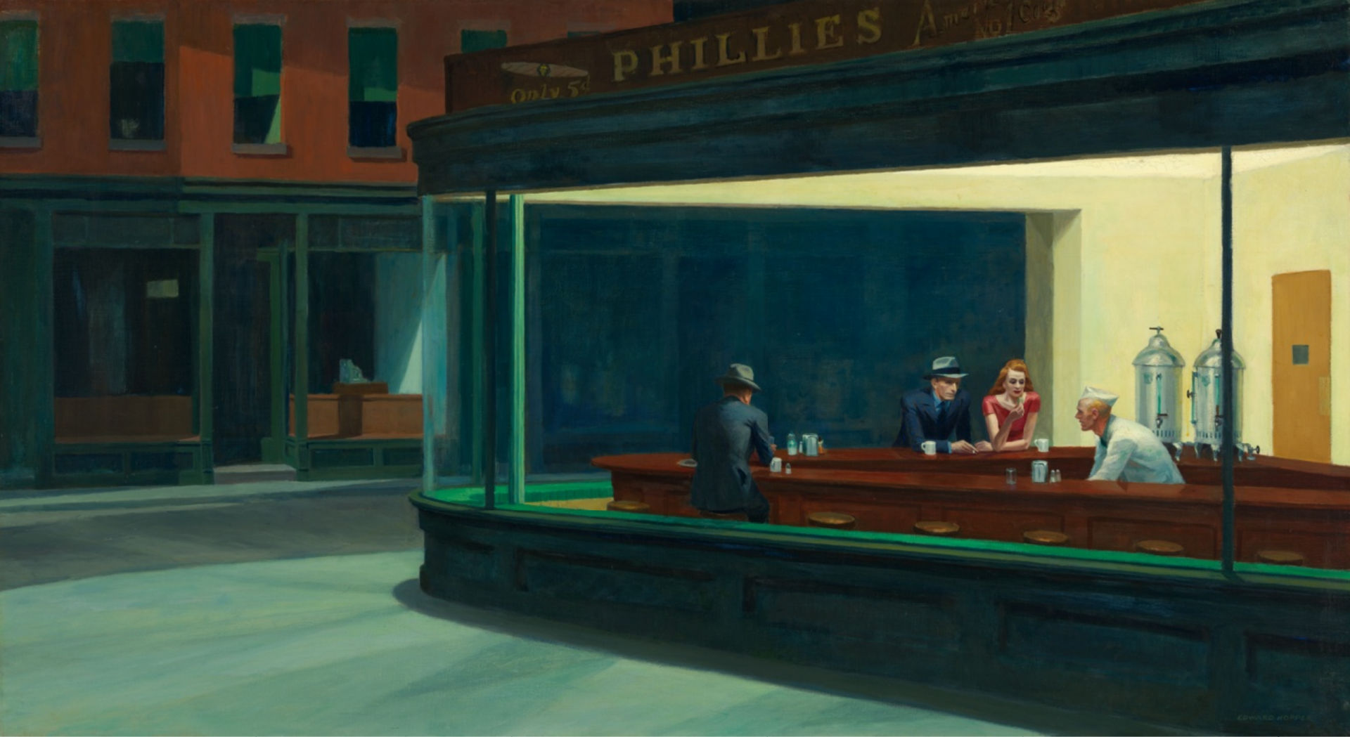 The 1942 painting 'Nighthawks' by Edward Hopper, featuring a bright, illuminated diner on a dark, empty city corner at night. Three customers — two men in suits and a woman in a red dress — sit on stools at the counter, lost in their own thoughts, opposite a male server in white apron. The scene is viewed through a large glass window which encompasses the curved corner facade of the diner. There's no visible door. Outside, the quiet city street is barren and devoid of both people and clutter. The painting radiates an air of loneliness and isolation despite the warmth of the light from the diner.