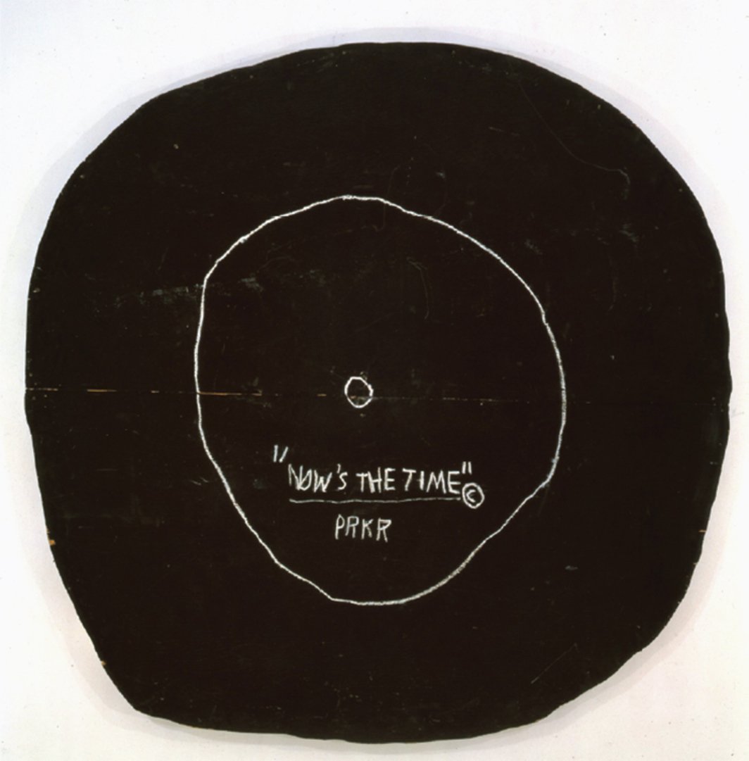 A circular painting reminiscent of a classic vinyl record, titled “Now's the Time”, featuring inscriptions artistically scrawled on a phantom black wood background.