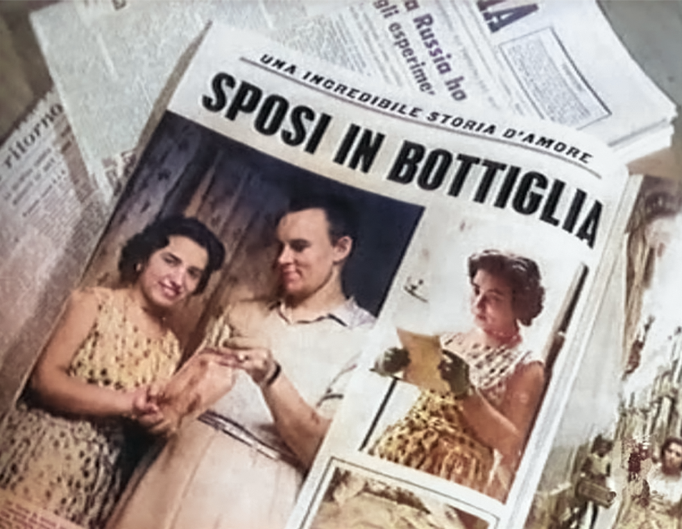 A colorized photograph of a newspaper page depicting a man and a woman together, holding hands. The page is titled Sposi in Bottiglia or Bride and Groom in a Bottle.