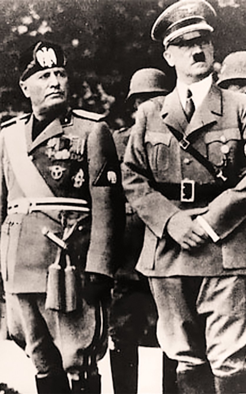 Benito Mussolini (left) and Adolf Hitler (right) in uniform during Mussolini's formal visit to Munich in 1937.