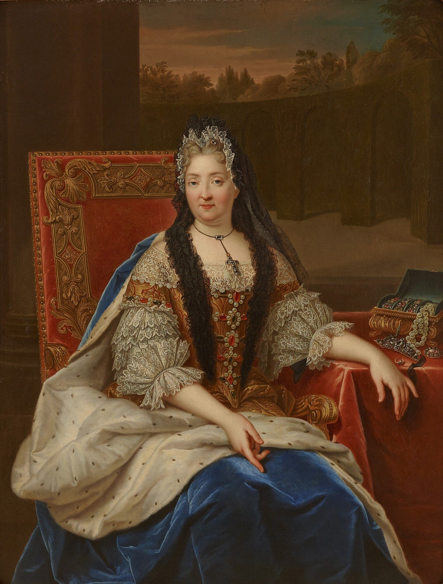 A portrait of duchess Charlotte de La Mothe Houdancourt sitting in a chair next to a desk. She is wearing a red dress covered in lace and a large blue cape.