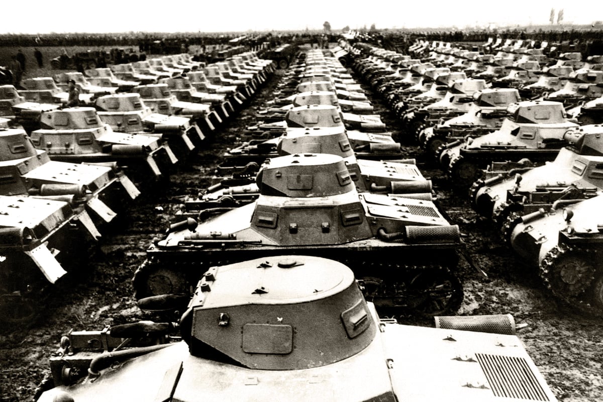 A black and white photo of a field full of German tanks, taken from above.
