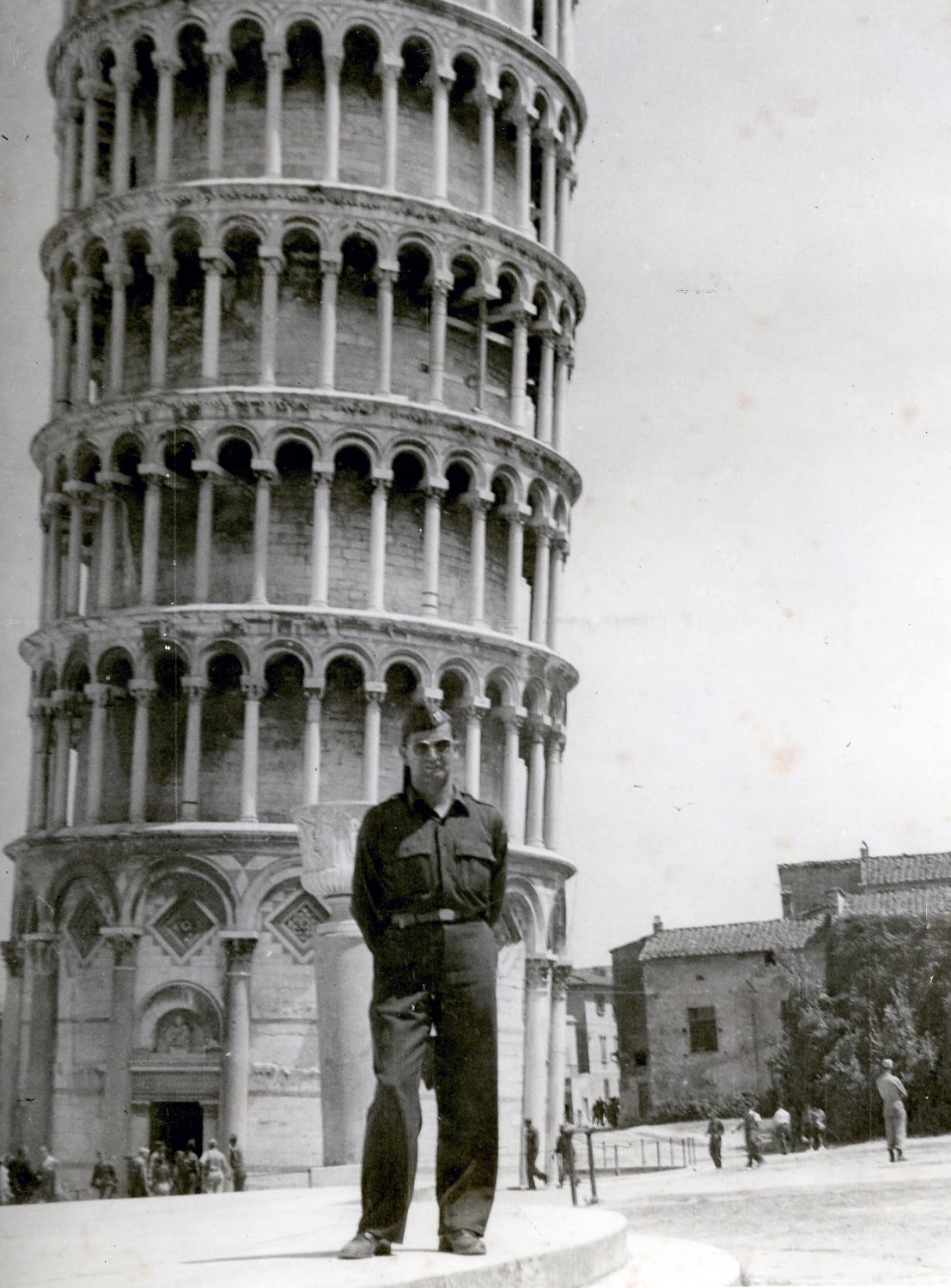 Hector P. Garcia in military uniform is standing in front of the Leaning Tower of Pisa, Italy