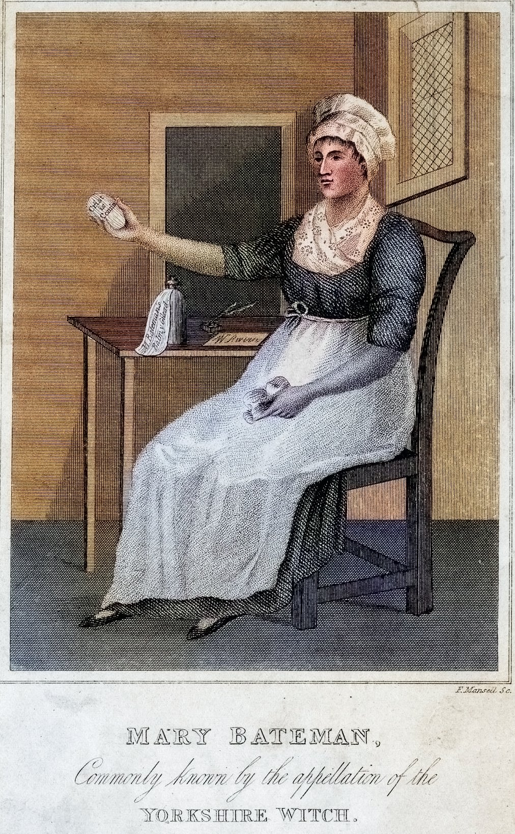 Full-length portrait of Mary Bateman, known as the Yorkshire Witch, seated to the left on a chair. In her right hand, she holds an oval object inscribed with “Crist is comin”. A table beside her displays a bottle marked “M. Bateman's / Balm & Gileard.”, an inkwell, quill pens, and a paper with”'W Rwvvi”. She is dressed in a bonnet, an apron over her dress, and a patterned scarf.