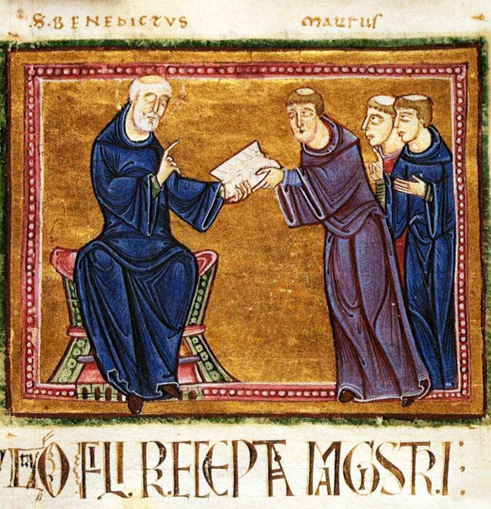 A in illustration from a medieval manuscript showing a seated Saint Benedict handing his writings to a group of tree standing priests, all wearing blue robes. The text at the top reads "S.Benedictus maestri".