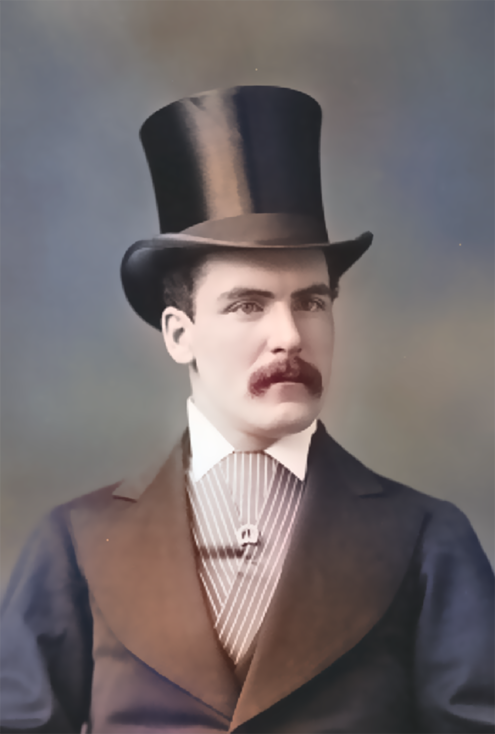 The image shows a man wearing a top hat and a black suit. He has a confident expression on his face.