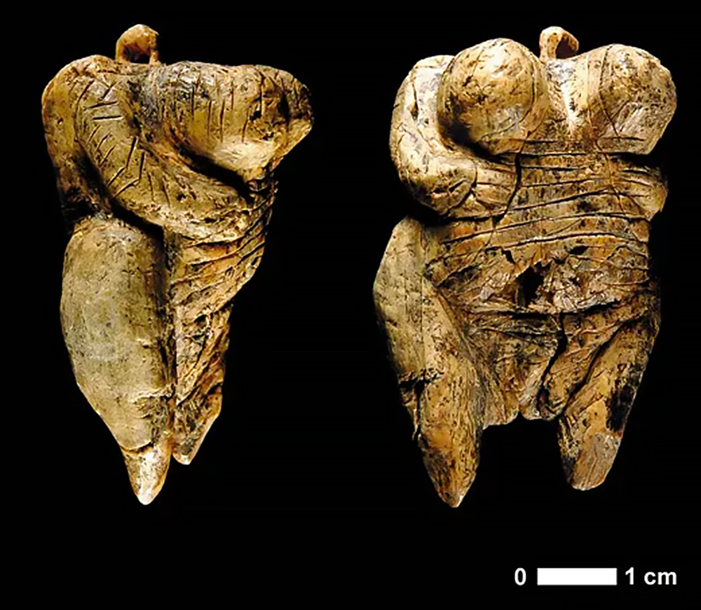 Venus of Hohle Fels, a 2.4-inch figurine intricately carved from a wooly mammoth tusk, believed to be one of the oldest known depictions of a human figure.