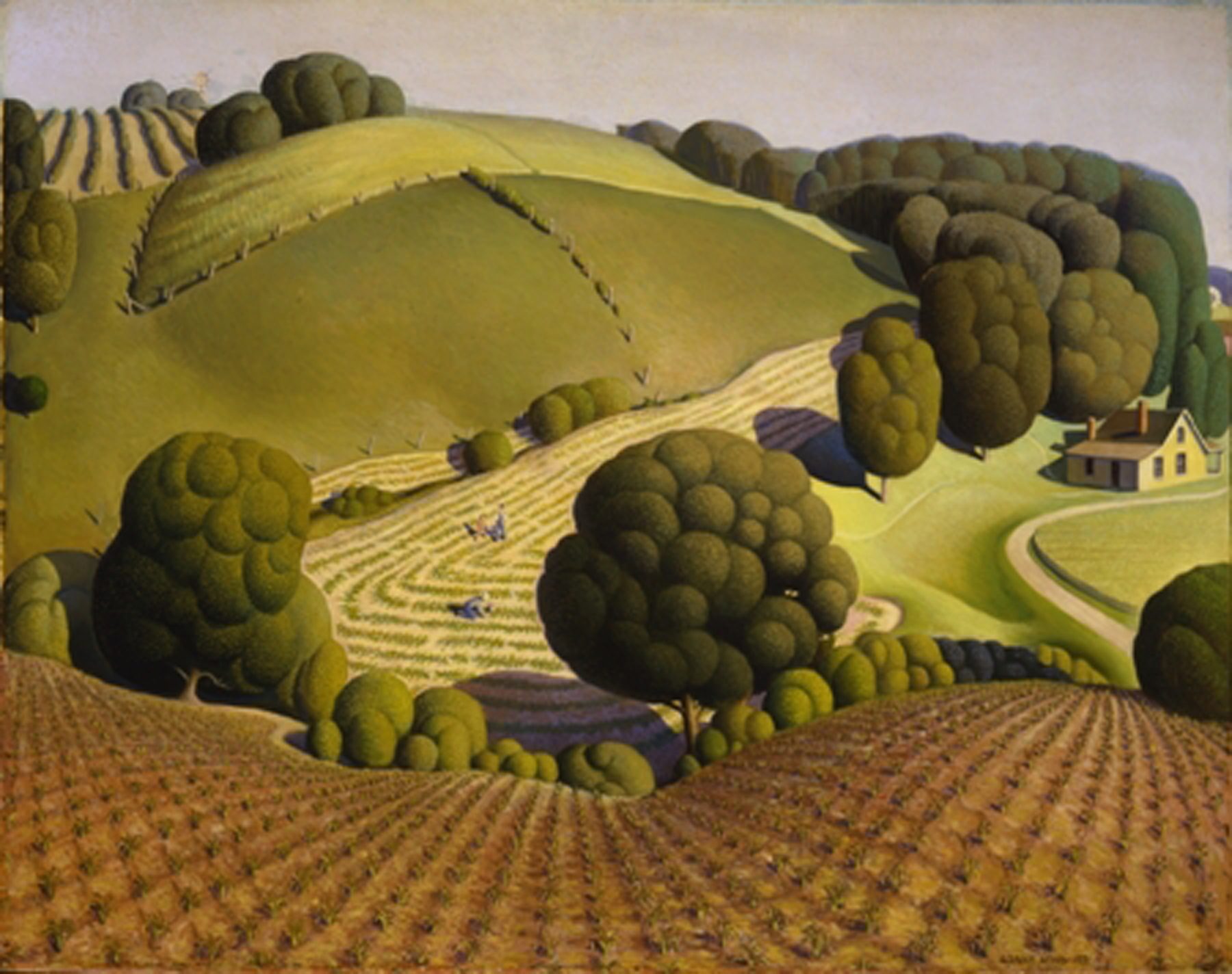 A landscape painting showcasing a lush, rolling countryside scene. In the foreground, young, vibrant green corn stalks are depicted, implying the start of a new growing season. Behind the cornfield, there are two slightly undulating hills dotted with small, mature trees, interspersed with patches of darker green fields. A small white house with a red roof is nestled among the trees in the middle distance, adding a human touch to this idyllic rural landscape.