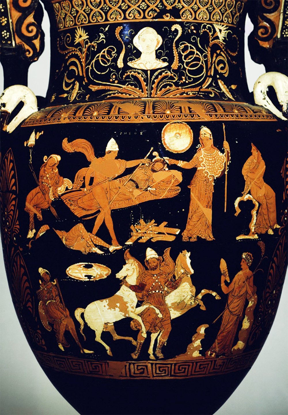 Detail of an ancient Greek vase depicting Odysseus and Diomedes stealing the horses of Rhesos, surrounded by intricate patterns and other mythological figures.