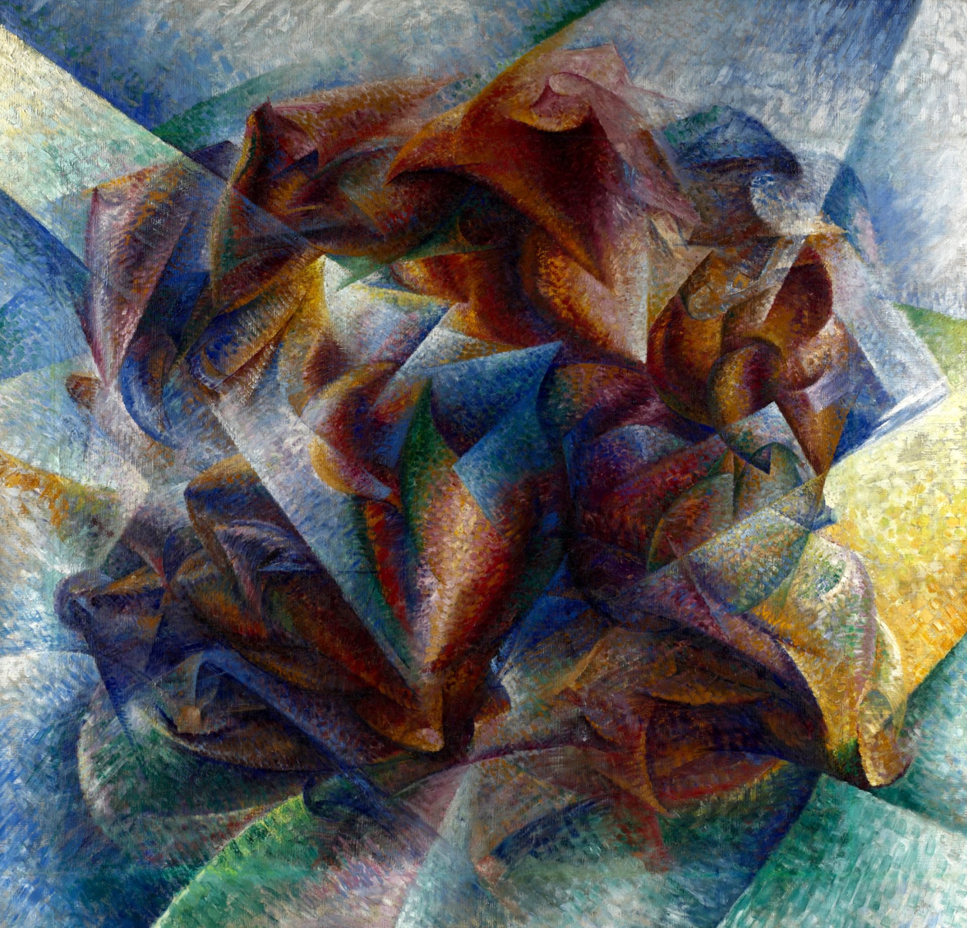 An artwork titled 'Dynamism of a Soccer Player' by Umberto Boccioni from 1913 captures the essence of Futurism with its swirling, overlapping forms and vibrant colors. The painting depicts the fluid motion and energy of a soccer player, abstractly rendered with fragmented shapes that seem to burst and blend into one another. The hues of reds, blues, and golds, combined with the intricate brushwork, convey a sense of rapid movement and the dynamic spirit of the sport.