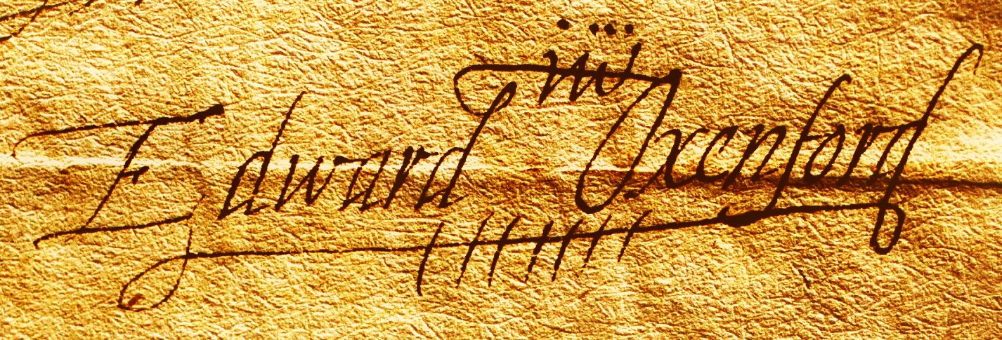 A close-up view of the autograph signature of Edward de Vere, 17th Earl of Oxford, written in flowing cursive script on a textured parchment-like background. The signature reads "Edward Oxenford" with pronounced, elegant flourishes, particularly on the capital "E" and the final "d". The ink is a deep brown-black, contrasting against the golden hue of the paper. The overall impression is one of historical significance and authenticity.