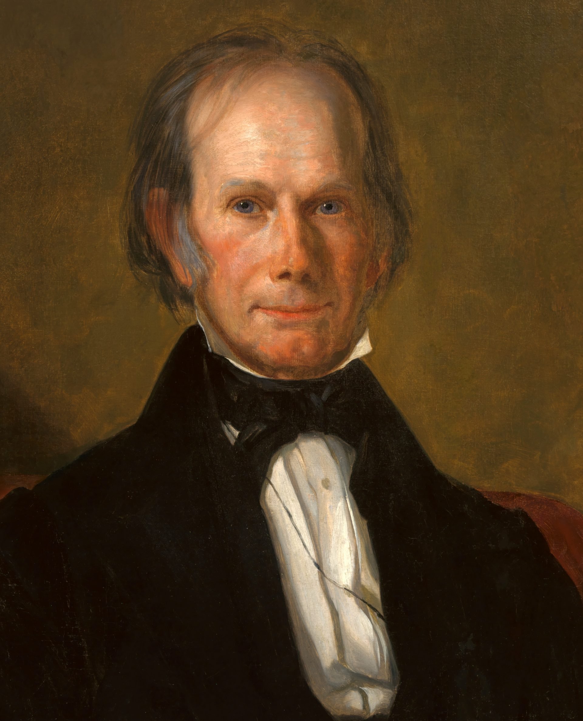 Portrait painting of Henry Clay by George Peter Alexander Healy in 1845, displayed at the National Portrait Gallery. Clay is depicted with a solemn expression, his head slightly tilted to one side. He has a high forehead, receding hairline, and wears a black suit with a white shirt and black bow tie. The background is a warm, muted gold, highlighting his face and attire.