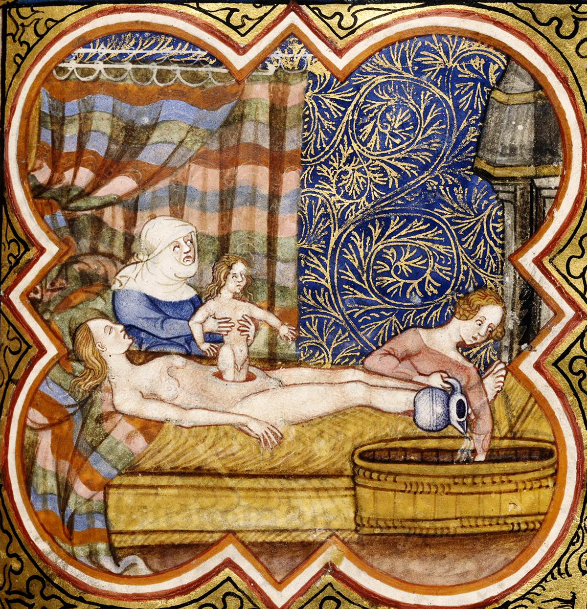 A detailed medieval illustration from the last quarter of the 14th century depicting a birthing scene. In the center, a woman lies on a raised bed, supported by a midwife dressed in blue. A newborn child is being held up by the midwife. To the right, another attendant pours water from a pitcher into a basin, possibly preparing for a post-birth ritual or cleaning. The backdrop includes intricate blue and gold patterns framed by a red and gold border. The scene provides insight into childbirth practices and the roles of attendants during the medieval period.