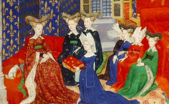 A detailed medieval painting depicting six women adorned in lavish dresses and headdresses, seated in an ornate chamber with patterned walls. The women are portrayed in various poses: some converse with each other, while one presents a decorated book. The vibrant colors of their garments, including deep reds, blues, and greens, are accentuated by intricate patterns and golden accents.