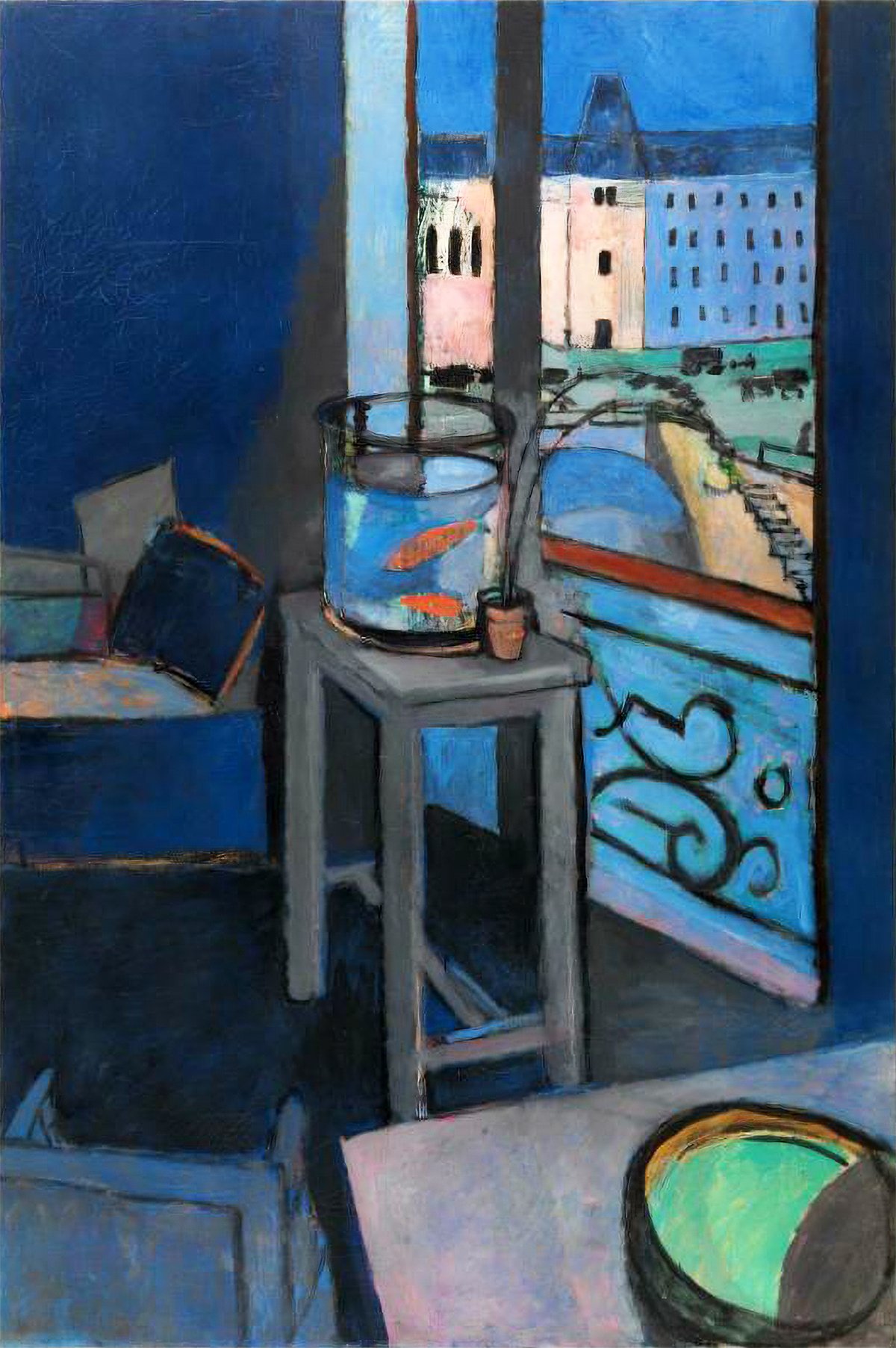 This image is Henri Matisse's painting "Interior with a Goldfish Bowl" from 1914. It depicts a room bathed in shades of blue and grey, featuring a clear goldfish bowl on a table in the foreground. Inside the bowl, vibrant orange-red goldfish contrast sharply with the muted tones of the interior. The room opens onto a view of the Seine and the Île de la Cité through a large window, with the outdoor scene rendered in warm sunlight. The curved lines of the bowl echo the arches of the Pont Saint-Michel bridge outside, integrating the interior with the exterior.