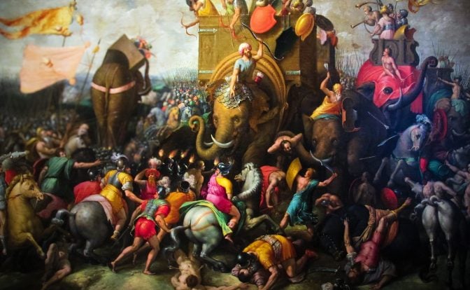 A dramatic painting of the Battle of Zama portraying the chaotic intensity of the Punic Wars with Carthaginian war elephants at the center, surrounded by battling soldiers in vibrant attire.