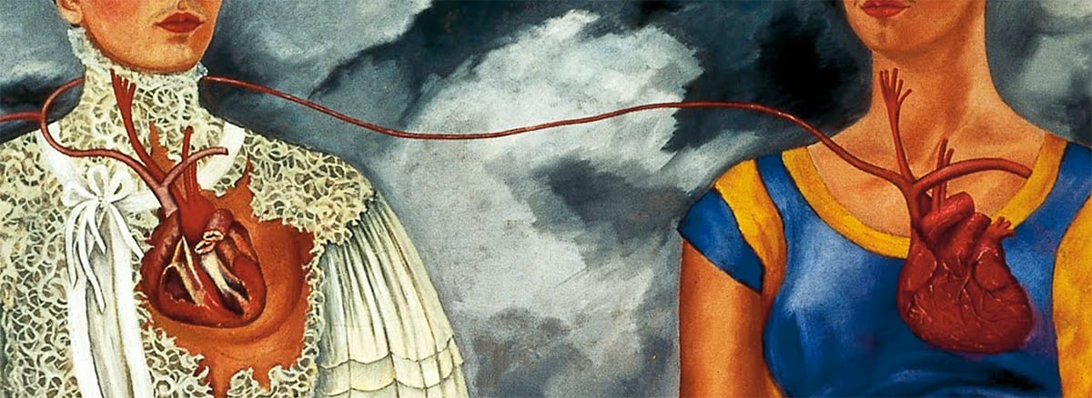 Close-up detail from Frida Kahlo's painting 'The Two Fridas,' highlighting the interconnected hearts of the two figures depicted. The heart on the left is anatomically intricate and visibly wounded, belonging to the Frida in a white Victorian dress. In contrast, the heart on the right, held by the Frida in a traditional Mexican outfit, is less detailed and more robust. A solitary artery links the two hearts, representing a bond of shared emotions and identity. Against the backdrop of a turbulent and stormy sky, the scene is imbued with a sense of deep intensity